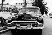 [Photo: a 1950s automobile] 